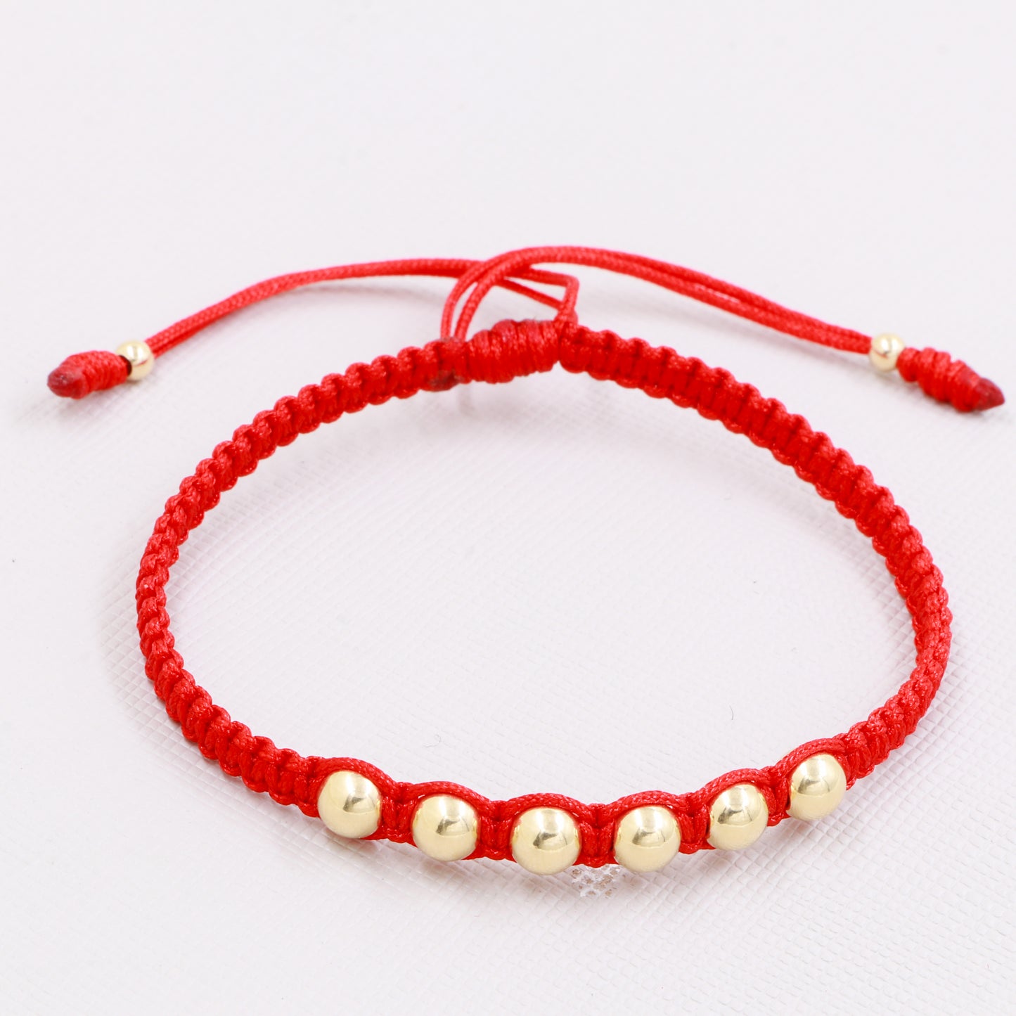 BRAZALETE HECHO A MANO CON BALINES DE ORO LAMINADO DE 18k